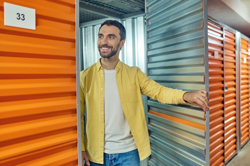 cheerful-man-standing-near-garage-door (2)